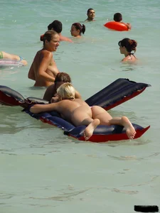 Sexy candid topless and nude beach girls