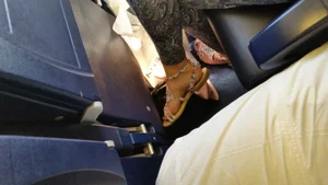 Feet in Sandals Plane Creepshot