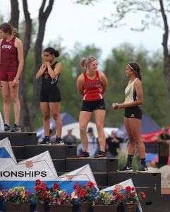 Candid track girls and runner