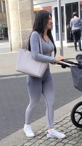 Gorgeous candid MILF wearing grey leggings on the street