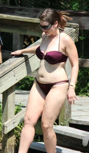 Two big boobed bikini babes in maroon bikinis