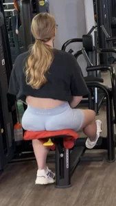 Hot blonde in gym just to show off her tight ass in blue shorts