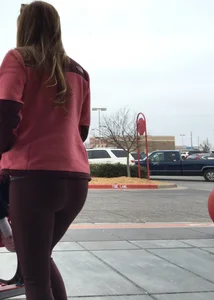 Target milf with a decent ass in maroon leggings