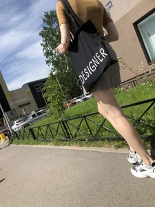 Candid Girl in a Skirt With Very Thin Hot Legs Walking on a Street Creepshots