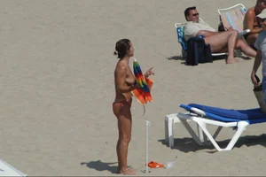Girls on a nude beach in Sitges, Spain