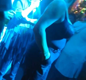 Busty milf in the disco. Big tits, big nipples