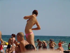 Beach voyeur babes in bikinis, thongs and topless