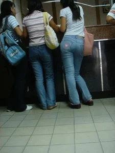 Cute Asian girl with a nice booty in tight jeans