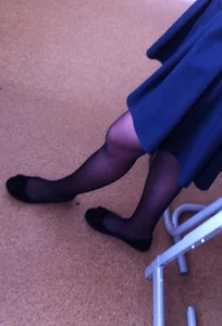 College candid teens' flats under desk, dangle creepshots