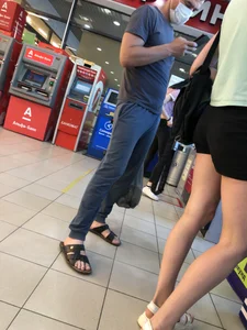 Creepshots of a Tall and Very Skinny Girl in Shorts and Sandals With Sexy Thin Legs Using an ATM