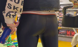 Skinny Milf in glossy leggings