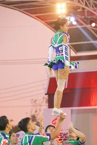 Bunch of athletic Thai cheerleaders at a competition