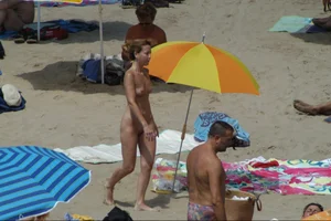 Girls on a nude beach in Sitges, Spain