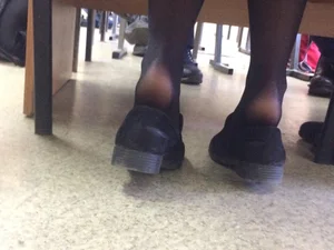 College Girl’s Feet in Black Pantyhose With Shoes Half Taken Off Under Table Candid Photos