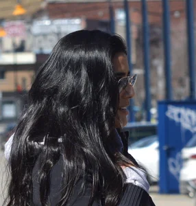 Thick brunette with a big booty in tight black leggings