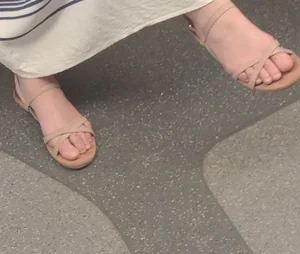 Closeup of a Candid Girl's Feet in Sandals in a Subway Train Creepshot