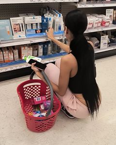 Latina bends over showing thong and chain lace!