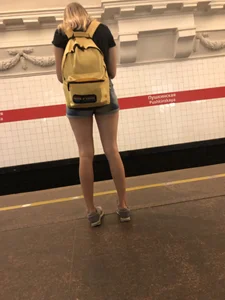 Cute Skinny Teen in Jean Mini Shorts Standing on the Subway Platform