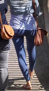Hot blonde girl in tight blue leggings with nice ass