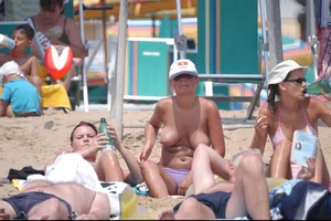 Girls on a nude beach in Bibione, Italy