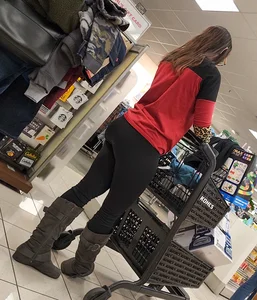 Brunette with a tight butt, boots, and a VPL
