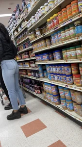 Sexy Asian girl grocery shopping in tight jeans with a nice ass