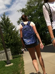 Hot college girl in little jean shorts showing some cheeks and legs