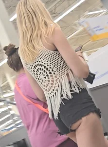 Thickish, nipple-pierced, trashy girl showing her ass for the boys