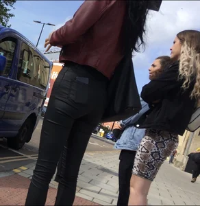 Chav brunette with a nice ass and vpl in tight black leather pants