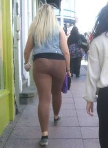 Thick blonde showing her panties in see through leggings