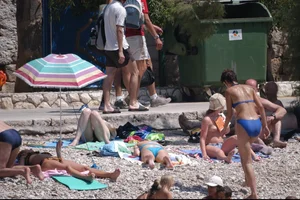 Nude girls on a beach in Hvar, Croatia