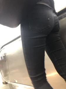 Skinny Girl in Black Tight Jeans on Subway Escalator Candid Closeup