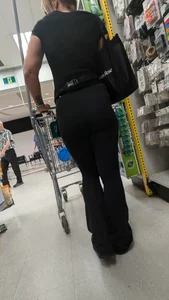 Beautiful tight blonde in black legging at dollar strore. oc
