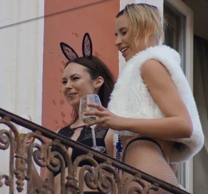 Bunch of girls in underwear hanging out at the balcony party