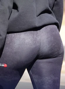Ass in Purple Leggings