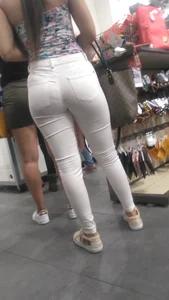 Latina with a nice ass in tight white jeans