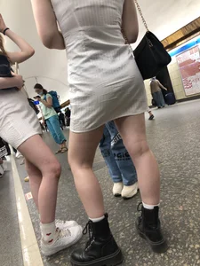 Group of Teens in Short Dresses in a Subway Train and on an Escalator Gallery