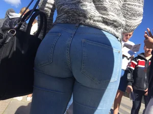 Bubble ass closeup in tight blue jeans street creepshots