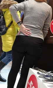 Big booty employee in tight black jeans with slight vpl
