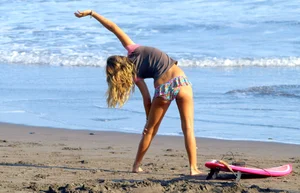 Candid surfer babes on the beach and in bikinis