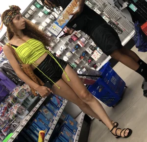 Hoodrat in leather booty shorts
