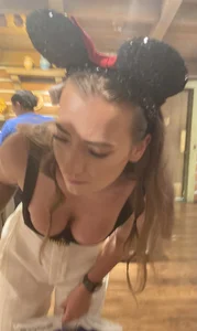 Dirty blond with her cleavage out at Disneyland