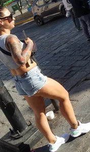 Nice legs and a little peach showing, shorts