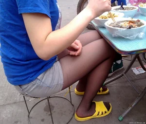 Girl in Shorts with Skinny Legs Cafe Creepshot