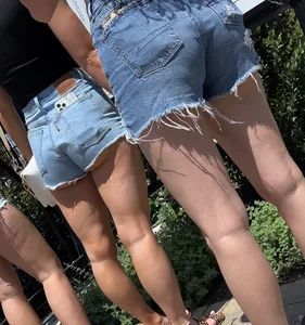 Blonde in cut offs with friends