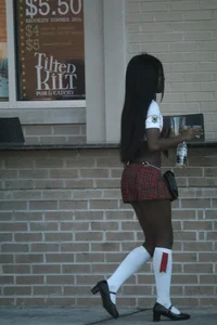 Sexy ebony Tilted Kilt employee in her uniform