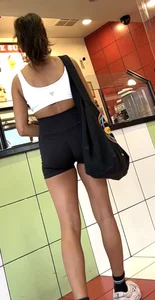 hot petite Indian chick showing some T&A in skimpy workout clothes