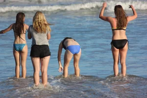Mix of candid girls at the beach and in bikinis
