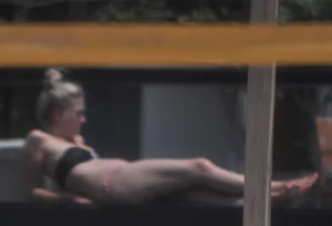 Resort Tan in pink bikini
