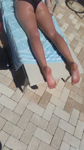 Girl lying on sunbed
